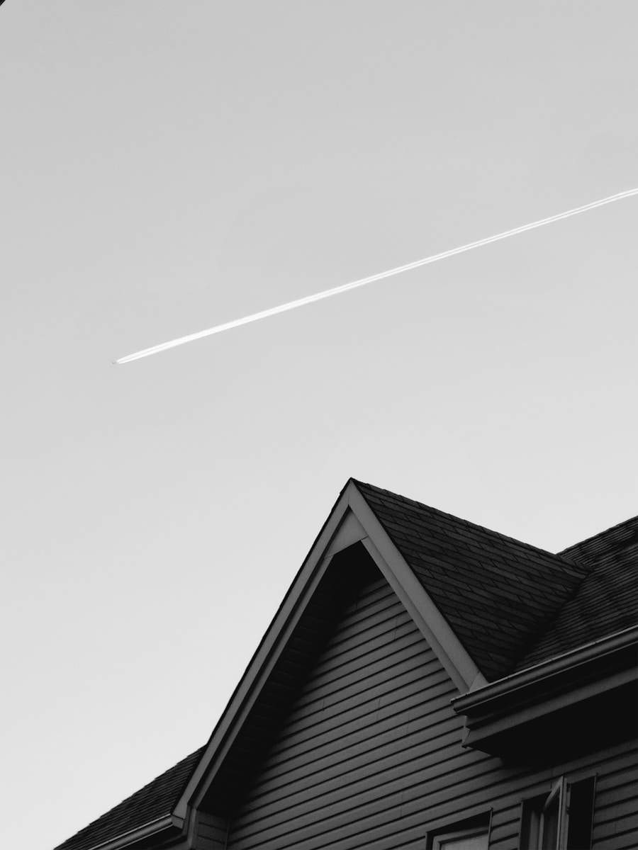 grayscale photo of a building with homeowners insurance Coverage for Your Roof